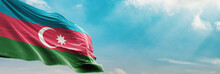 Azerbaijan Flag In The Blue Sky. Horizontal Panoramic Banner.
