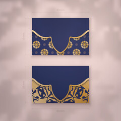 Wall Mural - Visiting business card template in dark blue with Indian gold pattern for your business.