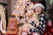 © Mat Hayward - Young child surprised with a golden retriever puppy dog present under the tree on Christmas morning.