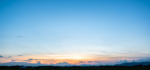 Wall Mural - colorful sunset and sunrise with clouds.blue and orange color of nature.many white clouds in the blu