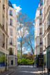 Paris, beautiful buildings in the 11e district, typical facades
