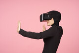 Fototapeta Młodzieżowe - woman in black hijab glasses virtual reality technology movie watching