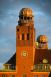 © Dragoș Asaftei - Malmo, Sweden - 2021: The central train station during a summer sunrise. Transportation infrastructure. Old architecture building as a landmark for Malmo city.
