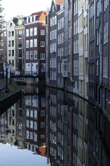 Wall Mural - Amsterdam canal view vertical at sunrise