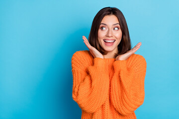 Poster - Portrait of attractive amazed cheerful girl looking aside copy space news isolated over bright blue color background