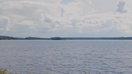 Wall Mural - Beautiful view on beautiful lake natural landscape  on beautiful summer day. Sweden.