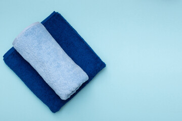 Composition of colored cotton towels. The concept of softness and purity