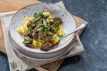 Canvas Print - Venison meatballs with creamy mushroom sauce and pappardelle pasta