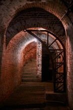 Old Brick Loft Wall In Secret Military Basement, Wine Vault In Old Mansion With Dim Lighting