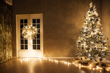 Wall Mural - Christmas tree with gifts lights garlands new year