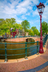 Sticker - Amsterdam  - old houses, bridges, canals and lantern. View of the famous old center of Amsterdam. Amsterdam, Holland, Netherlands