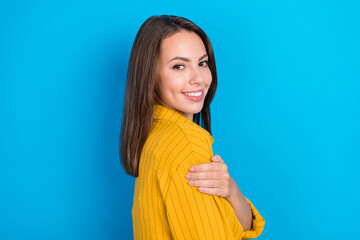 Poster - Profile side photo of young beautiful cheerful girl hand touch shoulder isolated over blue color background