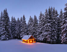 Marry Christmas And New Year. Wooden Hut On The Lawn Covered With Snow. The Lamps Light Up The House At The Evening Time. Winter Landscape. Mystical Night. Mountains And Forests. Wallpaper Background.