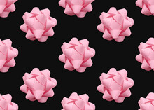 Seamless Pattern With Pink Bow In Close Up. Pink Lush Paper Bow On Black Background