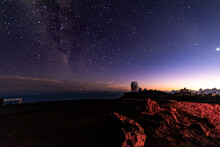 Night View From Haleakala National Park, With The Observatory And Milky Way On The Background - Maui, Hawaii, United States.