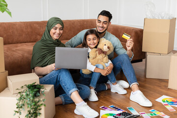 Sticker - Happy man woman and girl using laptop and credit card