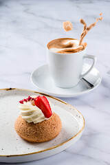 Poster - Close-up of Shu cream Japanese cream puff and hot coffee. Concept sweets enjoy eating.