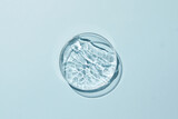 Fototapeta  - Petri dish with water and ripple in blue background
