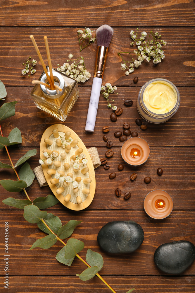Beautiful spa composition with burning candles on wooden background