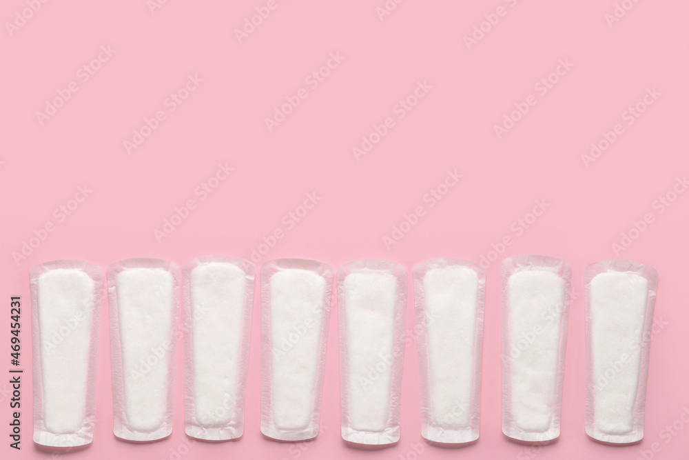 Menstrual pads on pink background