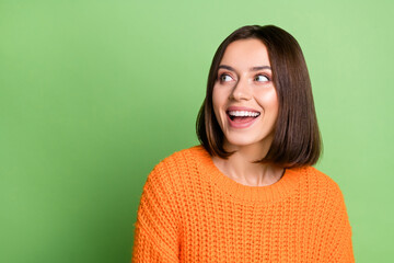 Poster - Portrait of attractive funny cheerful girl fantasizing copy space ad solution isolated over bright green color background