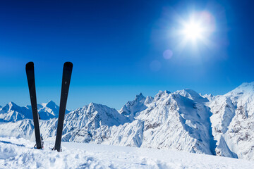 Skiing in the Swiss Alps. Ski, winter season, mountains and ski equipments