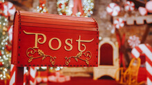 Closeup Red Post Box For Letters To Lapland To Santa Claus. Christmas Tradition. Decorative Mailbox Santa Claus Workshop, Wrapped Gifts Presents Boxes On Holiday Eve In Night On Xmas Background