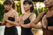 © Drobot Dean - Multiracial three women meditating during yoga practice