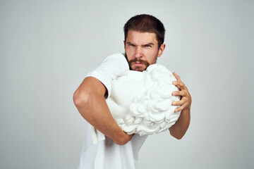 Wall Mural - man in white t-shirt sculpture architecture greek bust