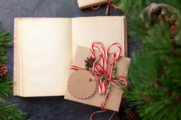 Wall Mural - Christmas gift box with craft decor and vintage book