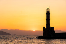 Silhouette Of The Old Lighthouse At Sunset, Chania, Crete, Greek Islands