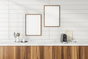 Close up view on kitchen interior with empty white posters