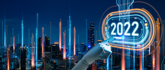 Wall Mural - concept of new year 2022 Vision Technology and Modern city with wireless network connection.Robot finger,Big data and business concept.Robot finger on word 2022 and city network connection background