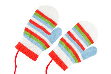 Woolen winter children's mittens, isolated on a white background, close-up, warm clothes for kids