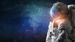 Astronaut in outer space. Spaceman with starry and galactic background. Sci-fi wallpaper. Elements of this image furnished by NASA