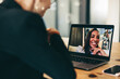 © Jacob Lund - Happy businesswoman attending a video conference in an office