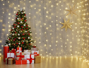 Wall Mural - Christmas tree and heap of gift boxes and copy space over grey wall with festive led lights