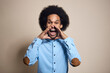 © gpointstudio - Mixed race man screaming very loud