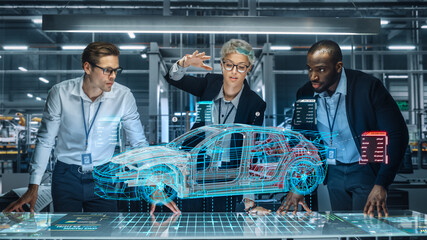 Poster - Diverse Team of Engineers Working in Office at Industrial Factory. Industrial Designers Discuss Electric Car Augmented Reality Hologramm. Specialists Work in Technological Car Development Facility.