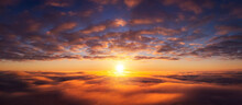 Wide Panorama Of Setting Sun From The Plane. Beautiful Dream-like Photo Of Flying Above The Clouds