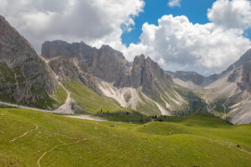 Wall Mural - view at a valley in the dolomites mountain