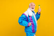© deagreez - Profile side photo of senior man workout drink water effort towel regime sweating isolated over yellow color background