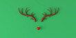 Abstract minimal Christmas reindeer face made with antlers and a bauble decoration nose. 3D Rendering