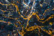 © Timelapse4K - Aerial top view a Hong Kong Corporate Buildings streets at night time.