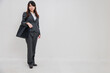 © photok - パンツスーツの日本人女性