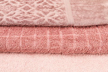 Wall Mural - Three pink towels - abstract background.