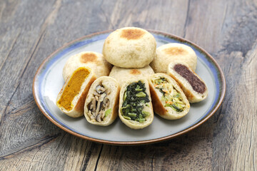 Wall Mural - Oyaki dumplings are stuffed with vegetables, seasoned with miso and soy sauce. Japanese food