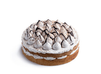 Sponge cake decorated with small meringue isolated on white