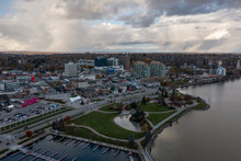 Sunset Fall Drone View Of Barrie Waterfront Downtown With Blue Skies And Clouds  Centennial Park And Lakeshore Drive  Road With Fall Colours  