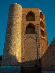 Wall Mural - minaret of the mosque in uzbekistan